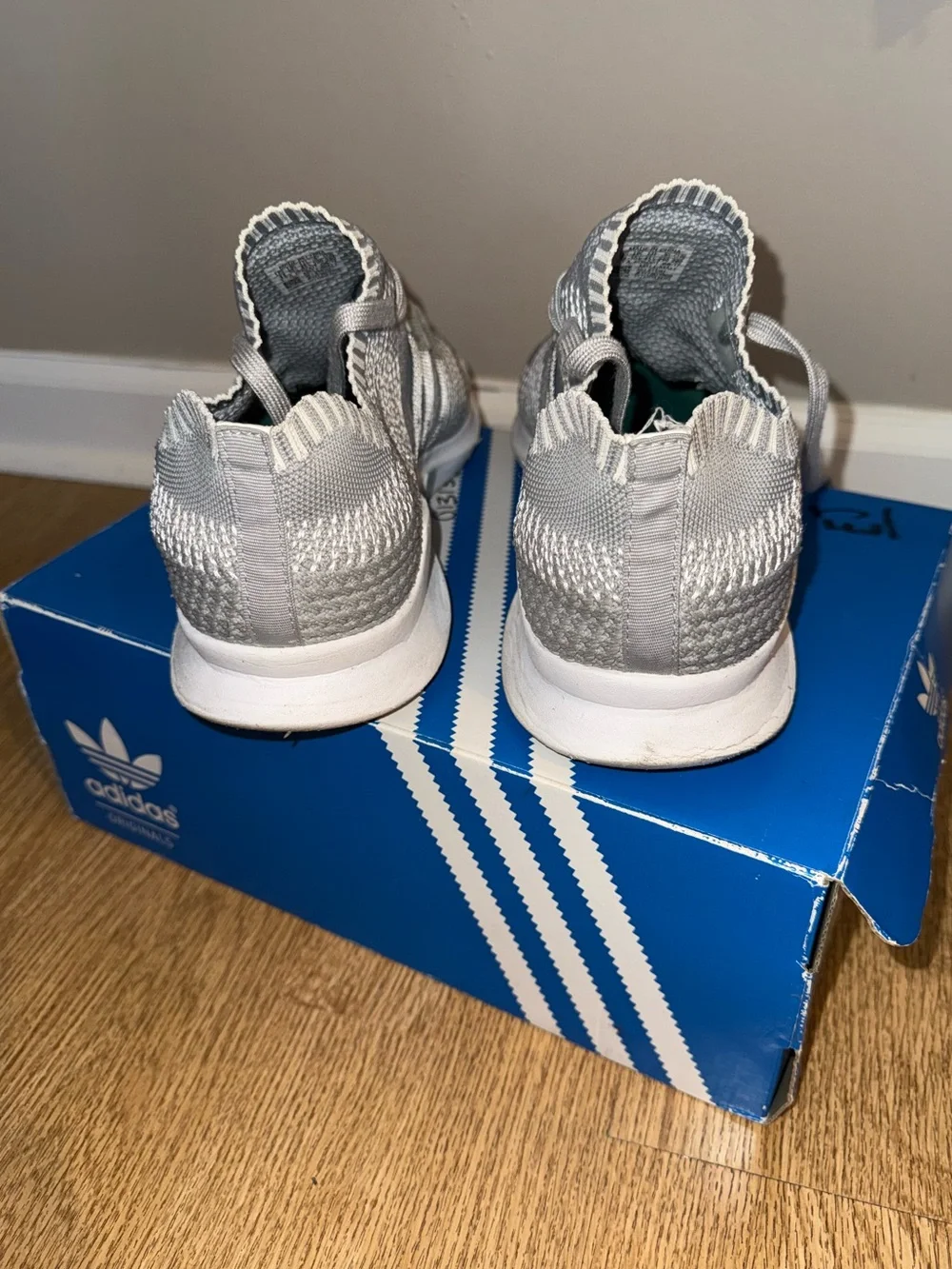adidas men’s Grey Knit Slip-On Sneakers
